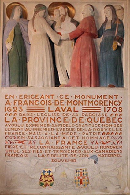 Oeuvre de Charlier dans l'église de Montigny-sur-Avre où  la dame en bleu est la France portant un sceptre qui observe la présentation de la Nouvelle-France à la Sainte Famille par Mgr de Laval. Oeuvre de Charlier dans l'église de Montigny-sur-Avre où  la dame en bleu est la France portant un sceptre qui observe la présentation de la Nouvelle-France à la Sainte Famille par Mgr de Laval.