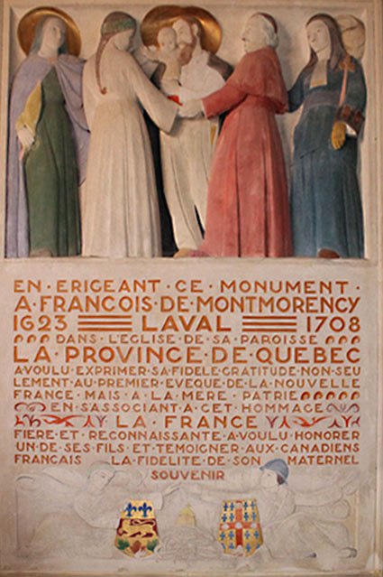 Oeuvre de Charlier dans l'église de Montigny-sur-Avre où  la dame en bleu est la France portant un sceptre qui observe la présentation de la Nouvelle-France à la Sainte Famille par Mgr de Laval. Oeuvre de Charlier dans l'église de Montigny-sur-Avre où  la dame en bleu est la France portant un sceptre qui observe la présentation de la Nouvelle-France à la Sainte Famille par Mgr de Laval.